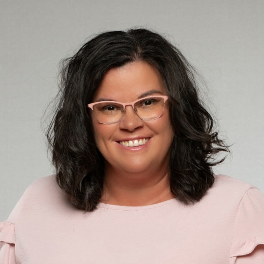 Professional headshot of Angela Stegner